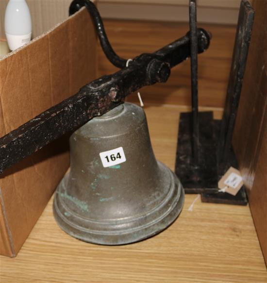 A school-type bell, numbered 17, on cast iron suspension bar